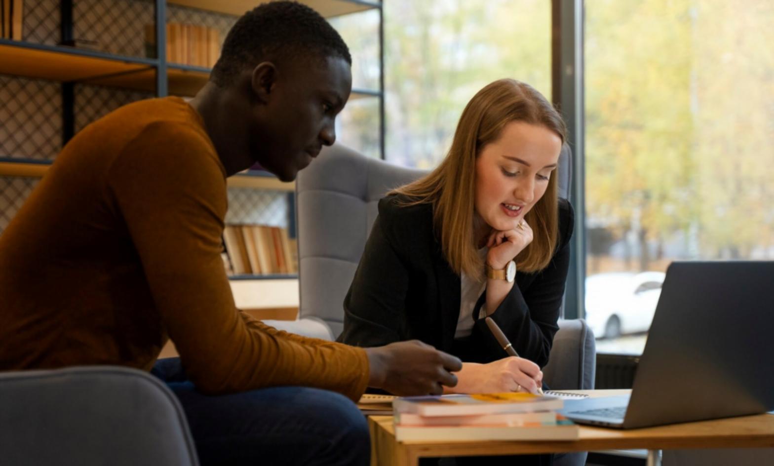 Collaborative financial planning session showing supportive environment